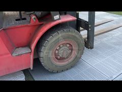 Stop Damaging Your Lawn. See How Flyon Turf Protection Flooring Handle Heavy Machinery.